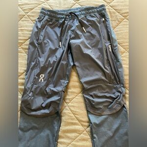 ON Women’s Water resistant Running Pants in blue/grey colour size M